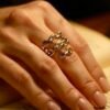 The I Speak Fluent Gucci ring is a bold ode to fashion’s playful side. Crafted in a chic gold-plated chain-link design, it radiates runway glamour with effortless confidence. Adjustable for a perfect fit, it’s versatile enough to stack or wear solo; a statement piece that turns whispers of luxury into a language of style.