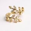 Embrace Italian elegance with this gold-plated wrap ring, featuring two graceful olive branches adorned with sparkling accents. Timeless, delicate, and effortlessly chic.