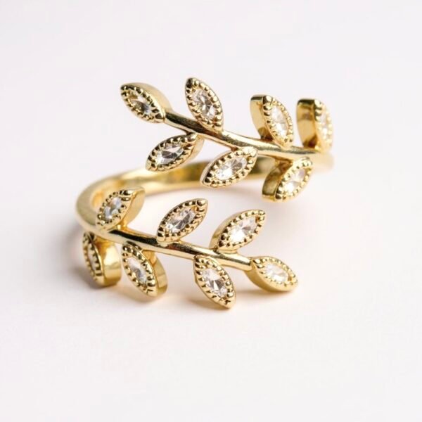 Embrace Italian elegance with this gold-plated wrap ring, featuring two graceful olive branches adorned with sparkling accents. Timeless, delicate, and effortlessly chic.