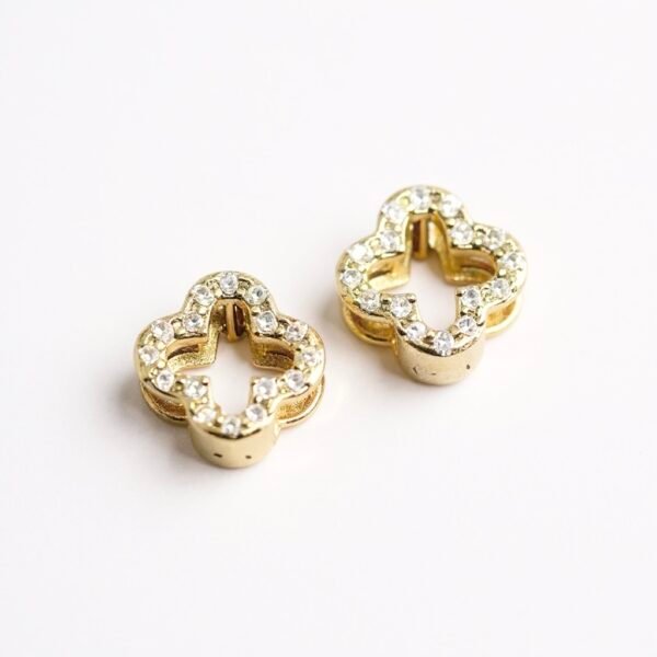 Our Quadrifoglio Earrings are a refined symbol of elegance and good fortune. Designed in a delicate clover silhouette, these earrings are adorned with sparkling cubic zirconia to reflect light with every movement. Available in both gold-plated and silver finishes, they offer versatile sophistication for both daily wear and special occasions. Lightweight and timeless, they embody Italian grace with a modern twist.