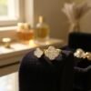 The Quadrifoglio ring celebrates the rarity of the four-leaf clover, a universal symbol of luck, hope, and faith. One clover gleams with dazzling cubic zirconia, while the other glows with a soft mother-of-pearl inlay — a balance of brilliance and serenity. The open band design allows for an adjustable fit, making it as versatile as it is meaningful. Expertly crafted in gold-plated brass, this ring is a refined token of elegance and good fortune, perfect for everyday wear or as a thoughtful gift.