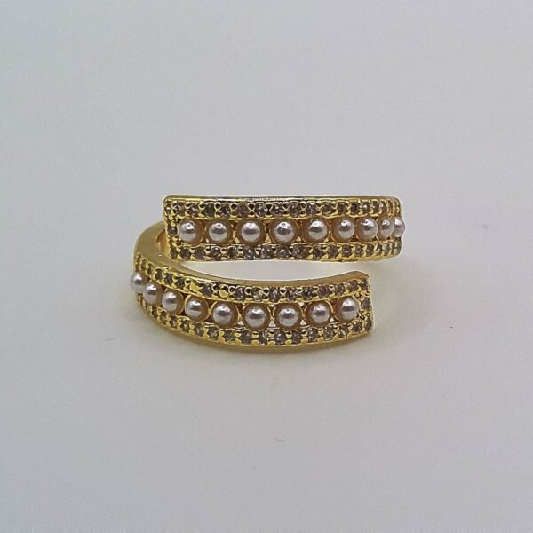 Gold wrap ring accented with small white pearls along two parallel bands.
