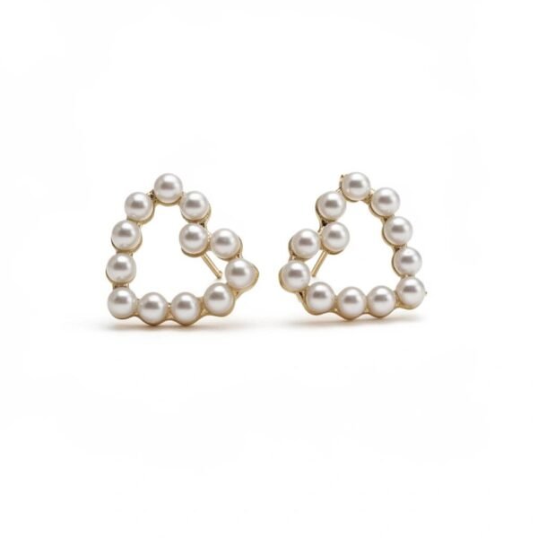 "Cuori di Aurora" Elegance at first light. Elegant open-heart earrings adorned with lustrous pearls. Crafted in gold-plated settings for a timeless, romantic look. Lightweight and comfortable for everyday elegance or special occasions.