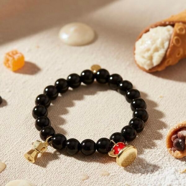 Inspired by Italy’s love affair with coffee, the Caffè Amore Bracelet pairs sleek black beads with two gold-plated charms — a moka pot and a red espresso cup — celebrating the warmth of a morning brew and the art of connection. Perfect for coffee lovers and anyone who treasures la dolce vita, this playful yet elegant bracelet adds a touch of Italian charm to any outfit.