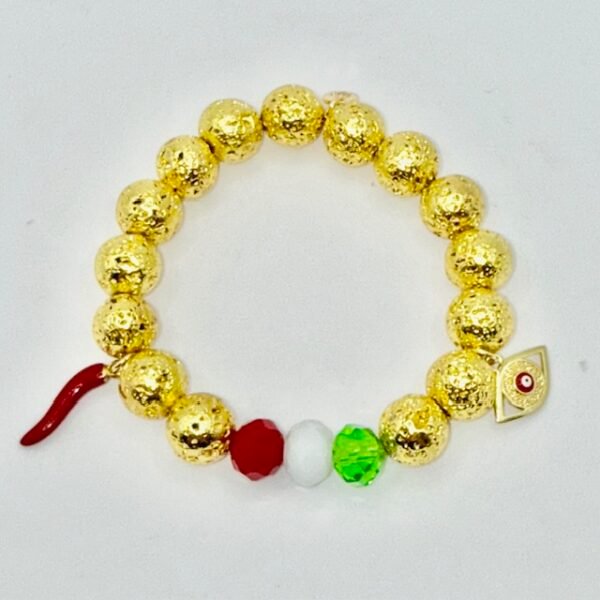 Celebrate your heritage with the Italia Amuleto bracelet — a bold fusion of Italian tradition and protective symbolism. Featuring radiant gold-tone textured beads paired with faceted crystals in the colors of the Italian flag, this bracelet is adorned with two powerful charms: the iconic red cornicello horn for good fortune and the protective evil eye to ward off negativity. Perfect for everyday wear or as a statement of cultural pride, it’s more than jewelry — it’s a talisman of heritage, luck, and love.