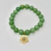 The Stella Verde bracelet features smooth green jade beads, paired with a radiant gold-plated Star of David charm accented in vibrant pink and green crystals. This piece embodies spiritual strength and balance, serving as a guiding light and a grounding connection to nature. Wear it alone for a statement of faith and serenity, or stack it for layered harmony.