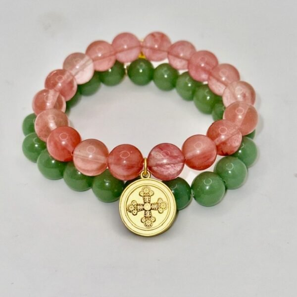 The Benedetta bracelet is crafted with radiant rose jade beads and adorned with a gold-plated medallion of faith. A timeless piece that embodies devotion, protection, and elegance, it brings together Italian heritage and modern refinement. Worn alone or layered, it serves as a reminder of strength and blessing in daily life. It pairs beautifully when stacked with the classic green jade beaded bracelet. The combination creates a fresh, balanced look that symbolizes harmony and renewal.