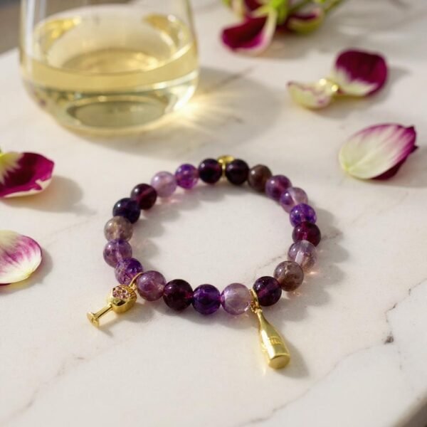 Raise a toast to elegance with the Vino Bliss Bracelet. Crafted with rich amethyst stones, this bracelet is adorned with playful gold-plated wine glass and champagne bottle charms — a sparkling nod to life’s joyful moments. Whether worn alone or stacked, it’s a stylish reminder to savor the sweetness of every day. For a chic statement stack it with the lilac crystal faceted bracelet for a layered look that’s both vibrant and celebratory. Together, they capture the perfect blend of sophistication and fun.