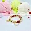 Dolce Amor, or Sweet Love in Beauty, is a joyful celebration of love and life. Designed with vibrant watermelon jade stones in refreshing shades of green, white, and pink, this bracelet captures the freshness of gelato and the warmth of affection. A luminous mother-of-pearl heart charm, gold-plated framed, and Amor gold-plated charm symbolizes purity, devotion, and timeless love. Playful yet elegant, it’s the perfect piece to wear alone or stacked with other Bella Pia favorites for a bold expression of amore.