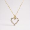 The Aurora Mini is a delicate symbol of love and light, designed with petite pearls set in a graceful heart silhouette. Perfect for layering or wearing as a subtle statement, this necklace embodies timeless beauty in a refined, minimalist form. Available in both gold-plated and silver finishes, it’s a versatile piece that shines with quiet elegance.