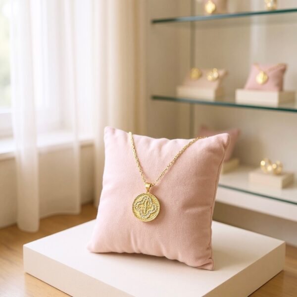 The Benedetta necklace captures timeless grace with a gold-plated round medallion pendant, intricately detailed with a radiant cross framed in shimmering crystals. Inspired by devotion and elegance, this piece blends strength of faith with classic Italian artistry. A meaningful heirloom design to wear close to your heart, Benedetta is a symbol of protection, hope, and everlasting style