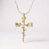 The Rosario Necklace beautifully intertwines devotion and nature’s elegance. Crafted in gold-plated, this pendant forms a cross made of delicate rose blooms, symbolizing love, faith, and eternal beauty. A sparkling center stone adds a touch of brilliance, making it both a meaningful keepsake and a timeless accessory. Perfect for those who want to carry faith and grace close to their heart.
