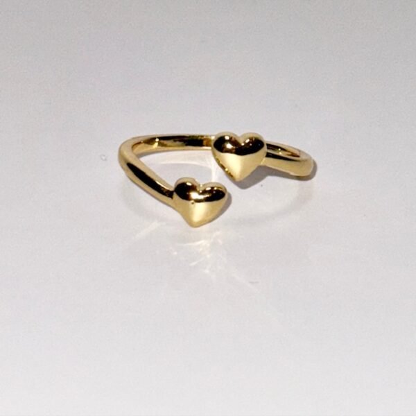 Gold open band ring with two polished heart-shaped ends facing each other.