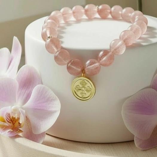 The Benedetta bracelet is crafted with radiant rose jade beads and adorned with a gold-plated medallion of faith. A timeless piece that embodies devotion, protection, and elegance, it brings together Italian heritage and modern refinement. Worn alone or layered, it serves as a reminder of strength and blessing in daily life. It pairs beautifully when stacked with the classic green jade beaded bracelet. The combination creates a fresh, balanced look that symbolizes harmony and renewal.