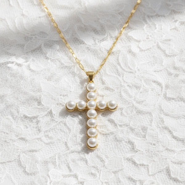Elegance at first light. The Croce di Aurora is a luminous expression of timeless devotion and elegance. Crafted in a gold-plated finish and adorned with radiant pearls, this cross necklace embodies purity and light. Its delicate detailing and refined symmetry make it a piece of spiritual beauty as well as a sophisticated accessory. Perfect for both meaningful occasions and everyday wear, this pendant radiates serenity and faith.
