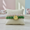 The Rosario a bracelet elevates the timeless elegance of rose quartz with not one, but two golden blooms. A bold gold-plated medallion with an embossed rose anchors the design, while a smaller, delicate rose charm rests gently off to the side. Together, they symbolize layered beauty, resilience, and love that grows in every direction. This thoughtful detail makes Rosario a statement of grace and femininity—perfect on its own or stacked with other Bella Pia favorites.