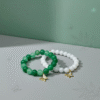 The Farfalla Bracelet is a celebration of renewal and elegance. Featuring radiant green jade beads symbolizing harmony and growth, it is adorned with a delicate gold-plated butterfly charm accented with shimmering stones. The butterfly, or farfalla in Italian, is a timeless emblem of transformation, freedom, and beauty. A versatile piece designed to uplift any look, it carries both style and meaning.