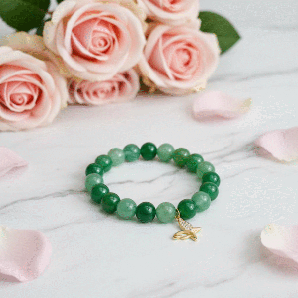 The Farfalla Bracelet is a celebration of renewal and elegance. Featuring radiant green jade beads symbolizing harmony and growth, it is adorned with a delicate gold-plated butterfly charm accented with shimmering stones. The butterfly, or farfalla in Italian, is a timeless emblem of transformation, freedom, and beauty. A versatile piece designed to uplift any look, it carries both style and meaning.