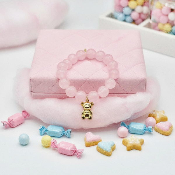 The Orsetto Ella Bella bracelet is a whimsical yet elegant keepsake, designed to celebrate life’s tender moments. Hand-strung with natural rose quartz stones—known as the stone of love and compassion—this bracelet radiates gentle energy and timeless femininity. At its heart, a charming teddy bear charm, available in luminous gold-plated or silver finish, symbolizes warmth, affection, and the protective embrace of childhood memories. Each detail is thoughtfully crafted to make this bracelet not only a jewelry piece but also a talisman of joy and comfort. Perfect for gifting to a loved one—or as a reminder of self-love—Orsetto Ella Bella is versatile enough to be worn alone for subtle elegance or stacked with other Bella Pia favorites for a playful, fashion-forward statement.