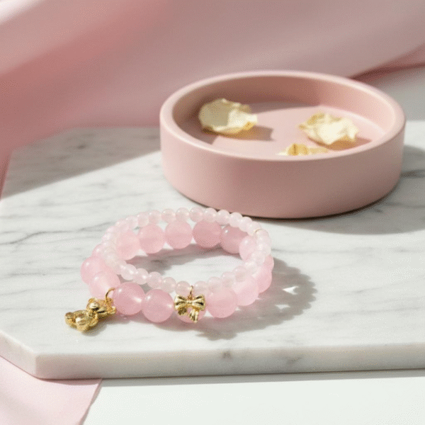 The Orsetto Ella Bella bracelet is a whimsical yet elegant keepsake, designed to celebrate life’s tender moments. Hand-strung with natural rose quartz stones—known as the stone of love and compassion—this bracelet radiates gentle energy and timeless femininity. At its heart, a charming teddy bear charm, available in luminous gold-plated or silver finish, symbolizes warmth, affection, and the protective embrace of childhood memories. Each detail is thoughtfully crafted to make this bracelet not only a jewelry piece but also a talisman of joy and comfort. Perfect for gifting to a loved one—or as a reminder of self-love—Orsetto Ella Bella is versatile enough to be worn alone for subtle elegance or stacked with other Bella Pia favorites for a playful, fashion-forward statement.