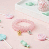 The Orsetto Ella Bella bracelet is a whimsical yet elegant keepsake, designed to celebrate life’s tender moments. Hand-strung with natural rose quartz stones—known as the stone of love and compassion—this bracelet radiates gentle energy and timeless femininity. At its heart, a charming teddy bear charm, available in luminous gold-plated or silver finish, symbolizes warmth, affection, and the protective embrace of childhood memories. Each detail is thoughtfully crafted to make this bracelet not only a jewelry piece but also a talisman of joy and comfort. Perfect for gifting to a loved one—or as a reminder of self-love—Orsetto Ella Bella is versatile enough to be worn alone for subtle elegance or stacked with other Bella Pia favorites for a playful, fashion-forward statement.