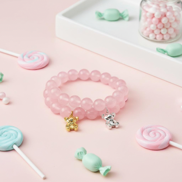 The Orsetto Ella Bella bracelet is a whimsical yet elegant keepsake, designed to celebrate life’s tender moments. Hand-strung with natural rose quartz stones—known as the stone of love and compassion—this bracelet radiates gentle energy and timeless femininity. At its heart, a charming teddy bear charm, available in luminous gold-plated or silver finish, symbolizes warmth, affection, and the protective embrace of childhood memories. Each detail is thoughtfully crafted to make this bracelet not only a jewelry piece but also a talisman of joy and comfort. Perfect for gifting to a loved one—or as a reminder of self-love—Orsetto Ella Bella is versatile enough to be worn alone for subtle elegance or stacked with other Bella Pia favorites for a playful, fashion-forward statement.