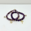 The Fede di Carolyn bracelet is a celebration of devotion, love, and lifelong friendship. Handcrafted with faceted amethyst stones, each bead carries calming and spiritual energy, symbolizing peace, clarity, and strength. The design is completed with three meaningful charms: A sparkling gold-plated cross framed with crystals, representing unwavering faith, a delicate light amethyst heart charm set in gold-plating, symbolizing pure love and compassion, and a gold-plated infinity symbol for eternity. This bracelet is a timeless reminder of unbreakable bonds and cherished connections.