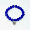 The Nodo D&G Bracelet is a heartfelt tribute to the unbreakable bond between mother and sons. Handcrafted with radiant sapphire-blue stones, it radiates strength, clarity, and devotion. At its center rests a beautifully detailed silver knot charm — a timeless symbol of connection, loyalty, and love that can never be undone. Whether worn as a daily reminder of cherished family ties or as a statement of elegance, Nodo D&G embodies both meaning and style. A piece that moves seamlessly from casual wear to evening elegance, it’s more than jewelry — it’s a story of family, heritage, and devotion