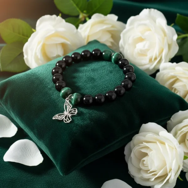 The Ali di Speranza bracelet is a symbol of resilience, renewal, and hope. Handcrafted with grounding black onyx and radiant green malachite beads, it is finished with a delicate silver butterfly charm — a timeless emblem of transformation and light. Each element is chosen to inspire strength through life’s challenges while celebrating the beauty of change. This bracelet is more than jewelry; it’s a gesture of compassion. A portion of the proceeds from every Ali di Speranza bracelet is donated to JAR of Hope, supporting research and awareness in the fight against Duchenne Muscular Dystrophy. Wear it as a reminder that every step forward is a flight toward hope.