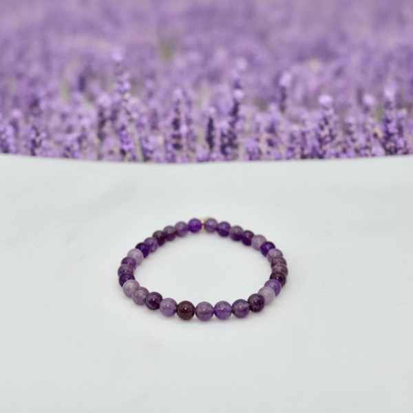 The Lavanda Serenità bracelet is crafted from natural amethyst beads, known for their calming and protective properties. With hues of soft lavender to deep violet, each bead carries the essence of balance, peace, and spiritual clarity. Designed to evoke the soothing calm of lavender fields at dusk, this bracelet is a gentle reminder to slow down, breathe, and find serenity in the present moment. Perfect for meditation, self-care, or simply carrying tranquility with you throughout the day.