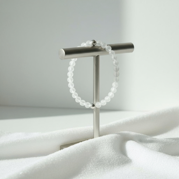 The Luce Bianca bracelet embodies purity and inner peace with its delicate white moonstone beads, softly glowing like captured moonlight. It symbolizes clarity, serenity, and resilience. The minimalist elegance makes it a versatile accessory—perfect alone for subtle refinement or stacked with other bracelets for a bolder statement. A timeless piece that aligns with both modern style and spiritual grounding, reminding you to embrace balance and light in every step of your journey.