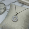 The Stella di Luce necklace embodies both beauty and meaning. Its circular pendant, delicately encrusted with sparkling crystals, features a Star of David cut-out at the center — a symbol of faith, protection, and unity. Crafted in sterling silver with a refined chain, this piece radiates elegance while honoring tradition. Versatile enough for everyday wear and sophisticated enough for cherished occasions, the Stella di Luce necklace is more than jewelry — it’s a timeless expression of light, love, and strength.