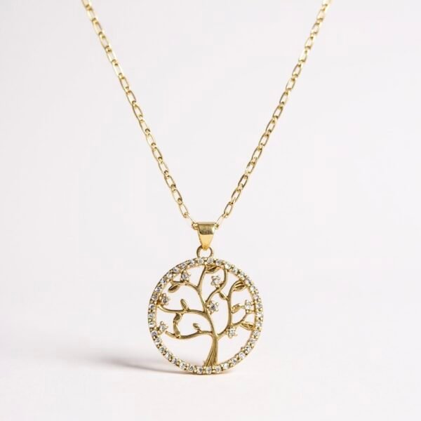 Celebrate life’s journey with the Albero di Vita Necklace, a radiant piece featuring a golden tree of life framed with sparkling crystal accents. Symbolizing strength, family, and new beginnings, this elegant pendant rests on a delicate gold-plated chain, making it a timeless reminder of resilience and growth. Whether worn daily or gifted to a loved one, it carries a message of beauty, balance, and enduring love.