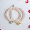 The Ella Bella Fiocco Bracelet is a delicate celebration of femininity and charm. Soft pink rose quartz beads, this piece features a dainty bow charm available in silver or gold-plated finishes. Perfect on its own or layered with other Ella Bella favorites, it’s a sweet symbol of grace, elegance, and playful sophistication. A bracelet that feels as special as the little moments it’s made to honor.