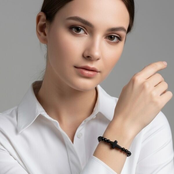 Embrace timeless simplicity with the Notte Nera bracelet, a unisex piece designed for those who value quiet strength and deep purpose. Handcrafted with polished black onyx beads and centered by a bold matte cross, this bracelet represents resilience, faith, and unwavering character. Its minimalist design makes it perfect for everyday wear—whether styled alone or stacked with other pieces. A reminder that true power speaks softly.