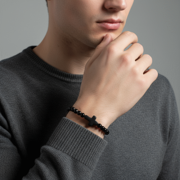 Embrace timeless simplicity with the Notte Nera bracelet, a unisex piece designed for those who value quiet strength and deep purpose. Handcrafted with polished black onyx beads and centered by a bold matte cross, this bracelet represents resilience, faith, and unwavering character. Its minimalist design makes it perfect for everyday wear—whether styled alone or stacked with other pieces. A reminder that true power speaks softly.