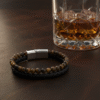 Embrace rugged sophistication with the Savanna Forge bracelet—a bold fusion of natural power and urban edge. Featuring polished Tiger’s Eye stone beads paired with a hand-braided black leather band, this bracelet radiates grounding energy and masculine style. Tiger’s Eye is known for confidence and protection, making this the perfect piece for men who move with purpose. Finished with a sleek stainless steel magnetic clasp for secure all-day wear, it’s the ideal accessory for work, a night out, or weekend adventure.
