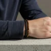Embrace rugged sophistication with the Savanna Forge bracelet—a bold fusion of natural power and urban edge. Featuring polished Tiger’s Eye stone beads paired with a hand-braided black leather band, this bracelet radiates grounding energy and masculine style. Tiger’s Eye is known for confidence and protection, making this the perfect piece for men who move with purpose. Finished with a sleek stainless steel magnetic clasp for secure all-day wear, it’s the ideal accessory for work, a night out, or weekend adventure.