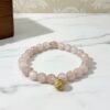 An eternal knot of love, strength, and unity. The Nodo Rosa Bracelet is a heartfelt tribute to the unbreakable bond between mother and daugthers. Handcrafted with radiant rose quartz stones, it radiates strength, clarity, and devotion. At its center rests a beautifully detailed gold plated knot charm — a timeless symbol of connection, loyalty, and love that can never be undone. Whether worn as a daily reminder of cherished family ties or as a statement of elegance, Nodo Rosa embodies both meaning and style. A piece that moves seamlessly from casual wear to evening elegance, it’s more than jewelry — it’s a story of family, heritage, and devotion.