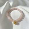 An eternal knot of love, strength, and unity. The Nodo Rosa Bracelet is a heartfelt tribute to the unbreakable bond between mother and daugthers. Handcrafted with radiant rose quartz stones, it radiates strength, clarity, and devotion. At its center rests a beautifully detailed gold plated knot charm — a timeless symbol of connection, loyalty, and love that can never be undone. Whether worn as a daily reminder of cherished family ties or as a statement of elegance, Nodo Rosa embodies both meaning and style. A piece that moves seamlessly from casual wear to evening elegance, it’s more than jewelry — it’s a story of family, heritage, and devotion.