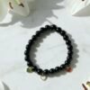 Carry a piece of Italy with you—wherever life takes you. The Cuore d’Italia bracelet is a timeless tribute to heritage, passion, and love. Handcrafted with polished black onyx stones for strength and grounding, this elegant bracelet features three gold plated enamel heart charms in the colors of the Italian flag—green, white, and red—each gold-plated for a luxurious touch. Perfect for those who cherish their Italian roots or simply admire the beauty and soul of Italian culture. Stack it, gift it, or wear it as a daily reminder that love knows no distance.