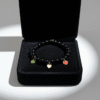 Carry a piece of Italy with you—wherever life takes you. The Cuore d’Italia bracelet is a timeless tribute to heritage, passion, and love. Handcrafted with polished black onyx stones for strength and grounding, this elegant bracelet features three gold plated enamel heart charms in the colors of the Italian flag—green, white, and red—each gold-plated for a luxurious touch. Perfect for those who cherish their Italian roots or simply admire the beauty and soul of Italian culture. Stack it, gift it, or wear it as a daily reminder that love knows no distance.