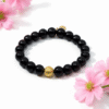 Bold. Refined. Unapologetically powerful. The Nero Reale bracelet blends minimalist luxury with timeless Italian elegance. Handcrafted using premium polished black onyx beads—known for their grounding energy and inner strength—this piece features a single 24k gold-plated accent bead as a symbol of purpose and prestige. A tribute to quiet confidence, this bracelet is made for those who lead by presence, not noise. Whether worn alone or stacked, Nero Reale delivers elevated style for every moment—from boardroom to night out.