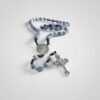 "Rosario di San Benedetto" Strength, Protection & Sacred Peace. The Rosario di San Benedetto is a powerful symbol of faith and protection, crafted for those who seek strength, guidance, and spiritual grounding. Featuring stunning blue crackle beads, hand-woven cord detailing, and an ornate crucifix, this rosary is anchored by the revered Saint Benedict medal — known for its centuries-old symbolism of protection against negativity and harm. Each bead offers a moment of peace, each prayer a step closer to clarity, comfort, and spiritual connection. Beautifully detailed and intentionally designed, this rosary makes a meaningful gift for yourself or someone you love. A timeless devotional piece to carry with you through every challenge, every blessing, and every prayer.