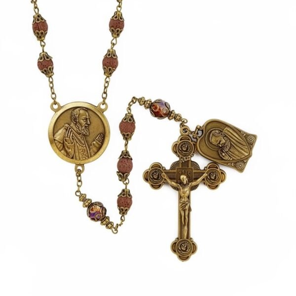 "Rosario di Padre Pio" Pray. Trust. Hope. The Rosario di Padre Pio is a deeply meaningful devotional piece inspired by one of the most beloved saints of compassion and healing. Featuring antique-gold finished beads and accents, this rosary includes beautifully detailed medals of Padre Pio, along with an ornate crucifix crafted with vintage Italian charm. Designed for those seeking comfort, strength, and spiritual connection, this rosary invites the faithful to embrace Padre Pio’s message: “Pray, hope, and don’t worry.” A cherished keepsake for anyone devoted to prayer, reflection, or the legacy of this remarkable saint.