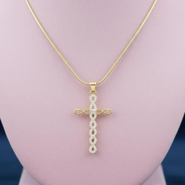 The Fede di Carolyn – Curo  Necklace “Faith that connects hearts forever.” The Fede di Carolyn Curo necklace is a radiant tribute to devotion, friendship, and everlasting love. Inspired by a lifelong bond built on faith, this elegant piece features a gold-plated infinity-woven cross—symbolizing the unity, loyalty, and unbreakable connection between two souls. Expertly crafted with shimmering CZ crystals set in warm gold plating, the design represents clarity, hope, and divine protection. Delicate, refined, and meaningful, this necklace is a timeless keepsake that honors the friendships and family ties that shape our lives. Wear it as a daily reminder of the love you give, the love you receive, and the faith that holds it all together.
