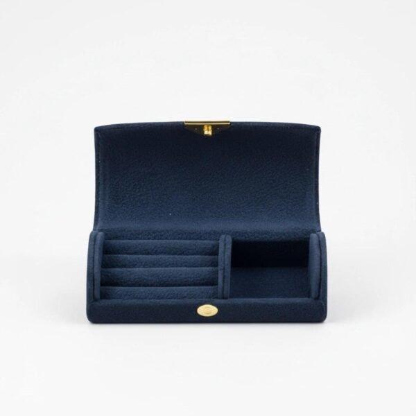 Velluto Reale Organizer  “Where luxury keeps your treasures safe.” Elevate your jewelry storage with the Velluto Reale Jewelry Organzier, a petite organizer wrapped in plush velvet for a touch of regal Italian elegance. Designed in a compact, travel-friendly size, it keeps your rings, earrings, bracelets, and keepsakes beautifully protected and perfectly organized. Its structured interior, soft velvet lining, and secure zipper closure make it ideal for slipping into a purse, luggage, or bedside drawer. Whether for travel or everyday storage, Velluto Reale brings together practicality, beauty, and timeless Bella Pia charm. Dimensions: 3.94" × 1.97" × 1.38" Features: Multiple compartments for rings, earrings, and small jewelry