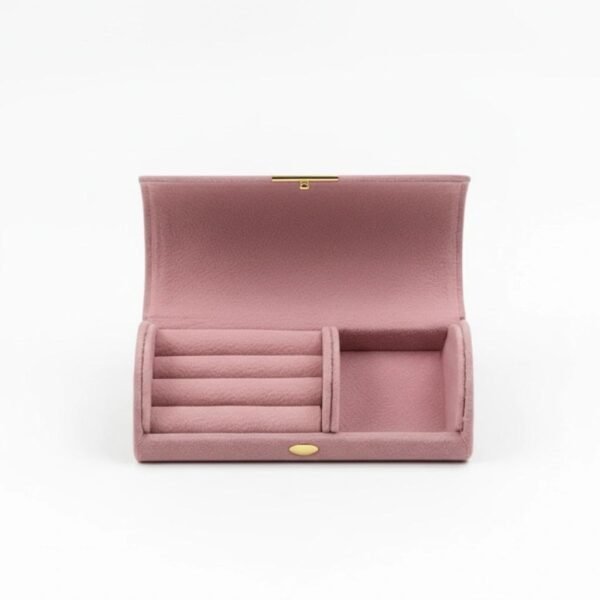 Velluto Reale Organizer “Where luxury keeps your treasures safe.” Elevate your jewelry storage with the Velluto Reale Jewelry Organzier, a petite organizer wrapped in plush velvet for a touch of regal Italian elegance. Designed in a compact, travel-friendly size, it keeps your rings, earrings, bracelets, and keepsakes beautifully protected and perfectly organized. Its structured interior, soft velvet lining, and secure zipper closure make it ideal for slipping into a purse, luggage, or bedside drawer. Whether for travel or everyday storage, Velluto Reale brings together practicality, beauty, and timeless Bella Pia charm. Dimensions: 3.94" × 1.97" × 1.38" Features: Multiple compartments for rings, earrings, and small jewelry