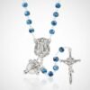 "Rosario di San Michele Azzure" Your heavenly shield, carried daily. Inspired by the timeless devotion to the Archangel Michael, the Rosario di San Michele Azzurro blends Italian elegance with deep spiritual meaning. Each blue marbled bead offers a calming rhythm to prayer, while the intricately sculpted St. Michael medallion honors Heaven’s fiercest protector. The ornate crucifix completes this heirloom-style piece, making it both a devotional treasure and a beautiful keepsake. Carry it as a reminder that courage surrounds you, protection walks with you, and faith is always within reach. Perfect for men, women, and teens seeking a strong, traditional, and beautifully crafted rosary.