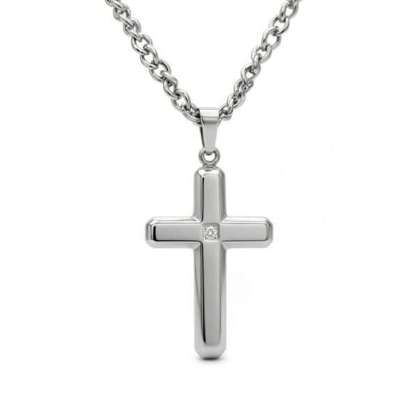 "Crocefisso Dorato Classico" A timeless symbol of faith and devotion. The Crocefisso Dorato Classico is designed for those who cherish both tradition and beauty. This gold-toned crucifix features intricate detailing and a radiant polished finish, capturing the sacred symbolism of the crucifix in an elegant, wearable form. Suspended from a 24-inch gold-toned curb chain, it offers durability, comfort, and a refined look that transitions seamlessly from daily wear to special occasions. A meaningful gift of devotion, strength, and grace.